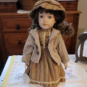 Classic Handmade Porcelain Doll with Striped Hat